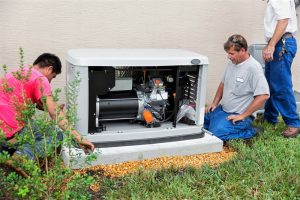three-technicians-working-on-generator
