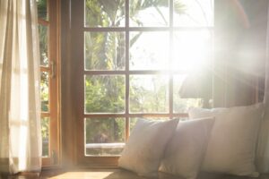 sun-shining-through-large-living-room-window
