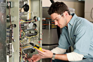 electrician-working-on-wires-in-HVAC-system